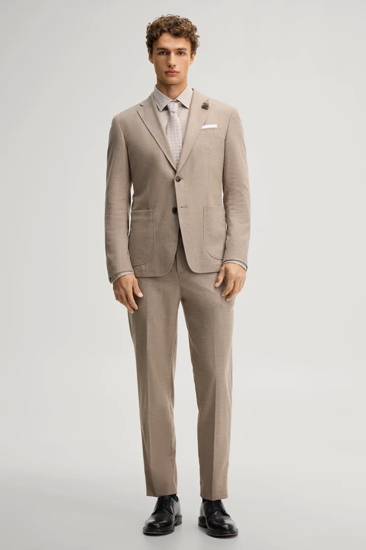 Leads to product detail page "Beige wool-blend suit jacket"