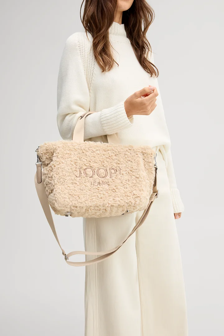 Leads to product detail page "Calduccio riccio yvette handbag in beige"