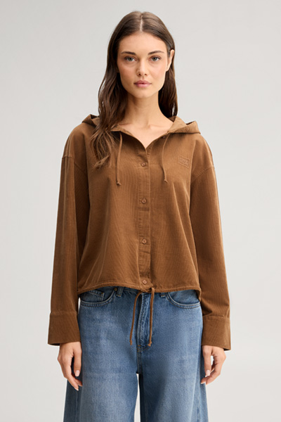 Leads to product detail page "Light brown corduroy blouse with a hood"