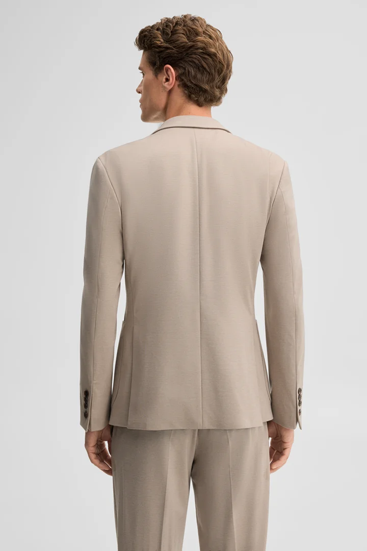Leads to product detail page "Modular blazer in beige"