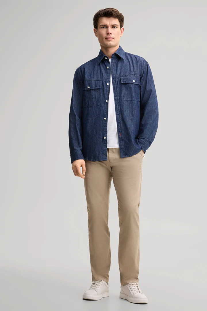 Leads to product detail page "Dark blue denim shirt"