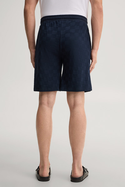 Leads to product detail page "Dark blue loungewear shorts"