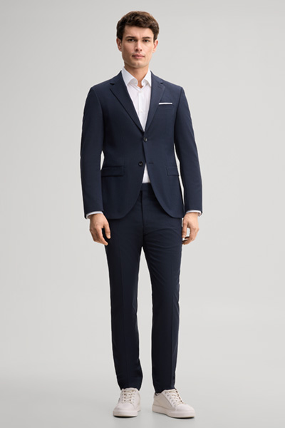 Leads to product detail page "Navy wool-blend suit"