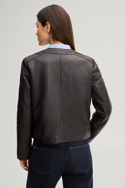 Leads to product detail page "Dark brown leather jacket"
