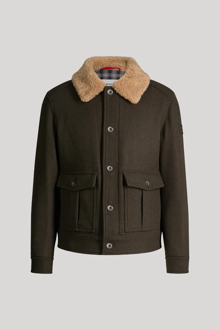 Leads to product detail page "Dark green wool-blend jacket"