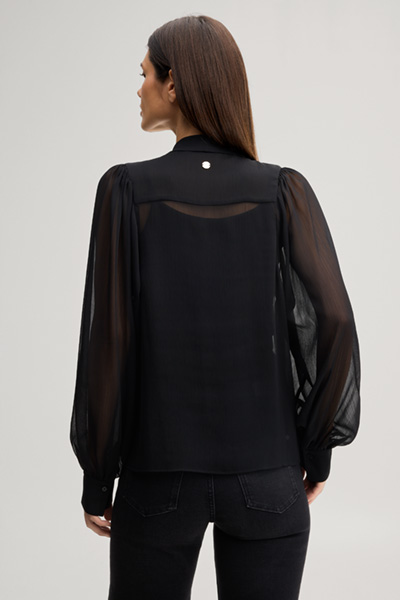 Leads to product detail page "Black chiffon bow tie blouse"