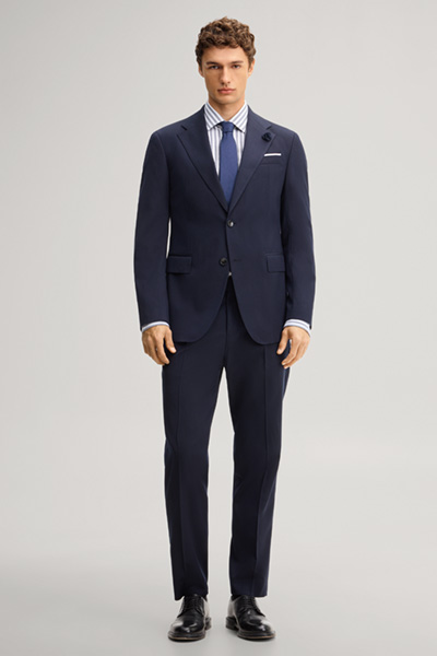 Leads to product detail page "Navy wool-blend suit"