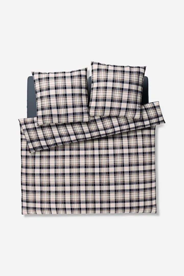 Leads to product detail page "JOOP! soft frames bed linen in blue and beige chequered"