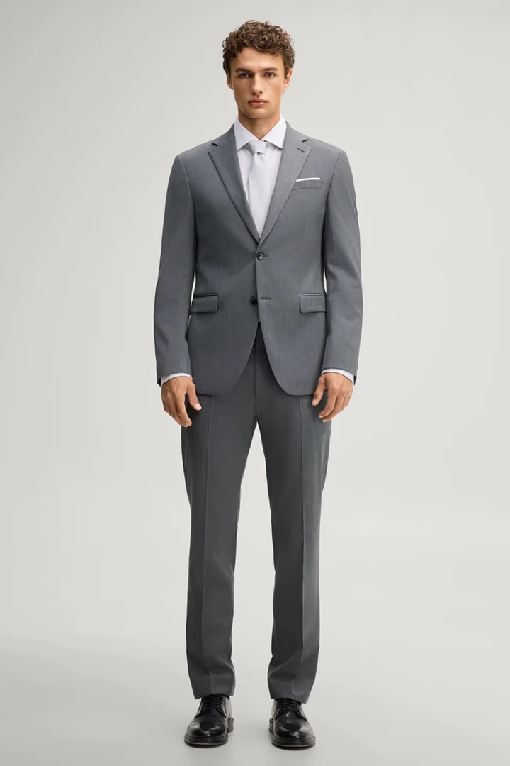 Leads to product detail page "Anthracite-coloured wool-blend suit"