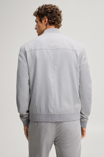 Leads to product detail page "Light grey blouson with a college-style collar"