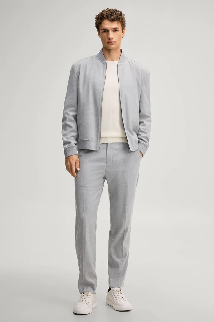 Leads to product detail page "Light grey blouson with a college-style collar"