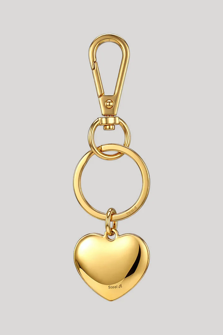 Leads to product detail page "Schlüsselanhänger in Gold"