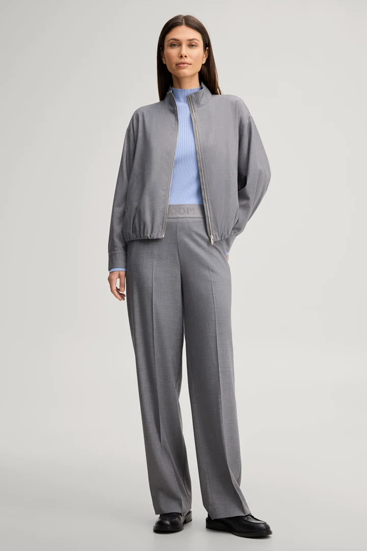 Leads to product detail page "Marl grey flannel trousers"