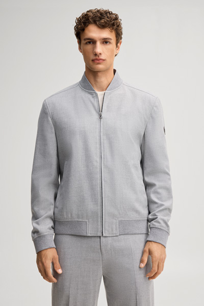Leads to product detail page "Light grey blouson with a college-style collar"