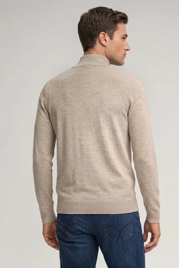 Leads to product detail page "Light beige virgin wool cardigan"