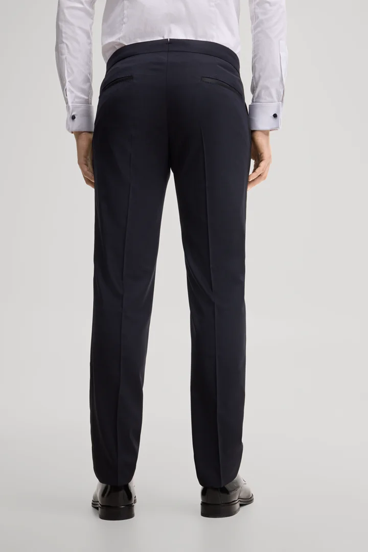 Leads to product detail page "Navy Wool-Blend Tuxedo Modular Pants"