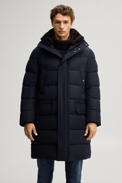 Führt zu Produktdetailseite „Steppmantel mit Kapuze in Navy"