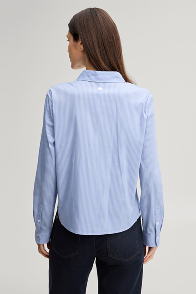 Leads to product detail page "Viscose-blend shirt in light blue and white stripes"