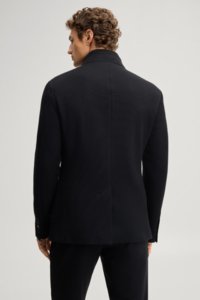 Leads to product detail page "Black suit jacket with a stand-up collar"