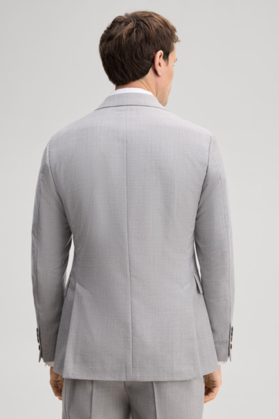 Leads to product detail page "Modular suit jacket in grey, made from virgin wool"