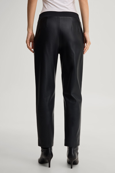 Leads to product detail page "Faux leather cigarette trousers in black"