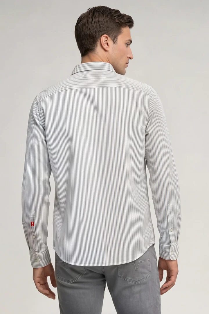 Leads to product detail page "Blue striped shirt"