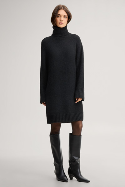 Führt zu Produktdetailseite „Strick-Kleid mit Rollkragen in Schwarz"