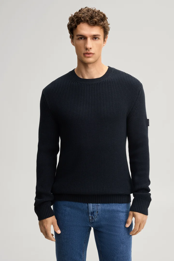 Leads to product detail page "Dark blue structured cotton crew-neck jumper"
