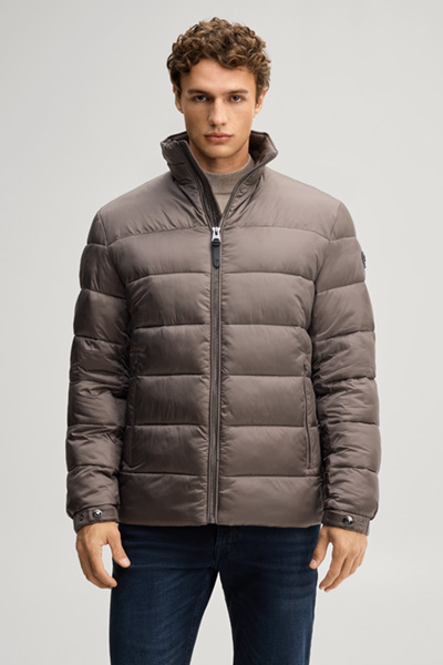 Leads to product detail page "Quilted jacket with a stand-up collar in taupe"