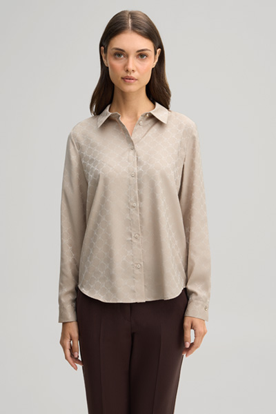 Leads to product detail page "Cornflower-coloured shirt in greige"