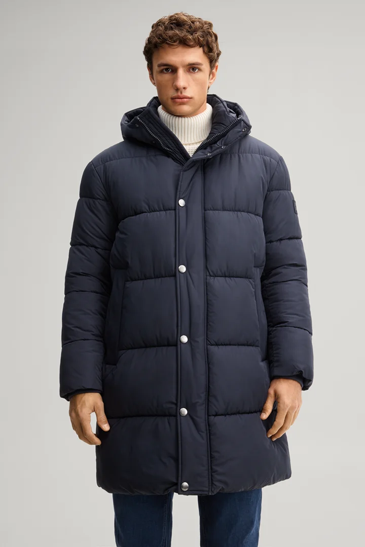 Leads to product detail page "Navy hooded parka"