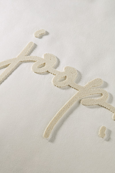 Führt zu Produktdetailseite „Zierkissenhülle JOOP! LABEL in Creme, 40 x 40 cm"