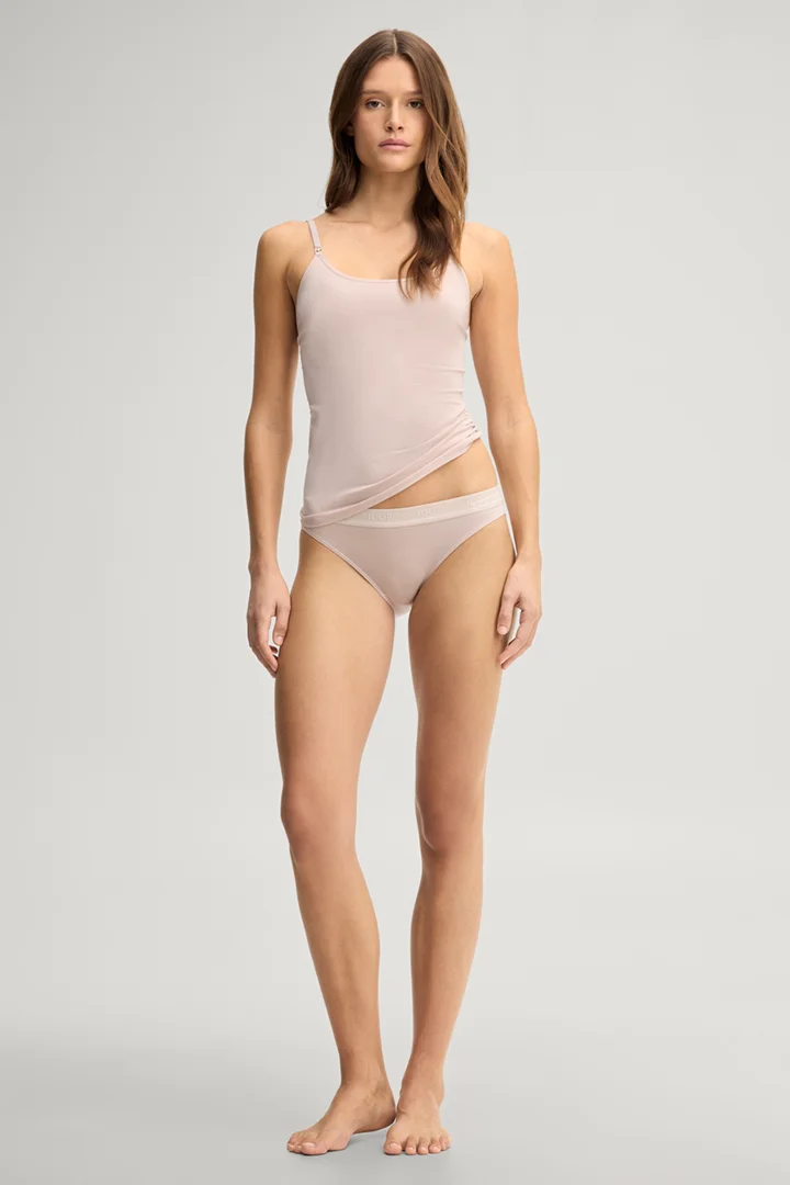 Leads to product detail page "Light pink loungewear top"