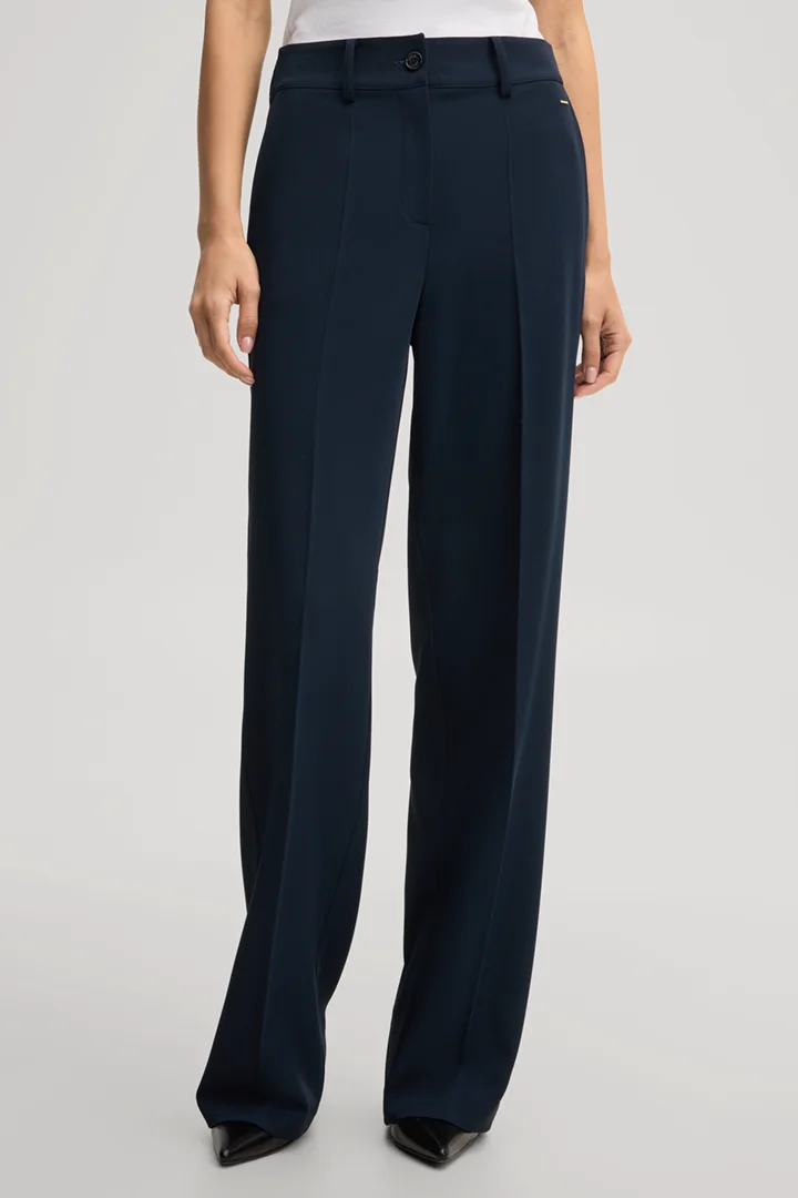 Leads to product detail page "Travel marlene trousers in navy"