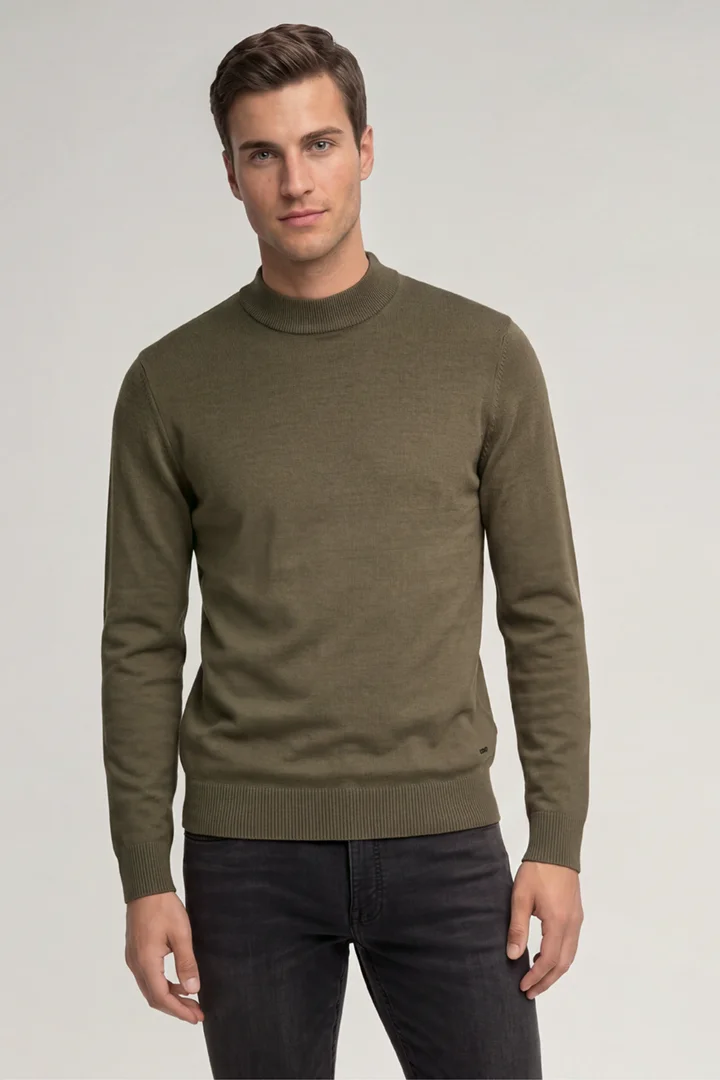 Leads to product detail page "Dark green virgin wool crew-neck jumper"