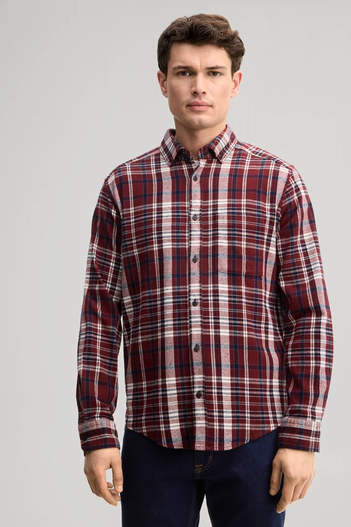 Leads to product detail page "Casual cotton shirt in a red checked pattern"