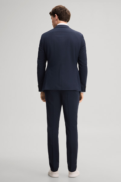 Leads to product detail page "Navy wool-blend suit"