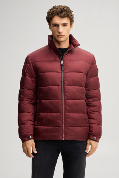 Leads to product detail page "Quilted jacket with a stand-up collar in burgundy"