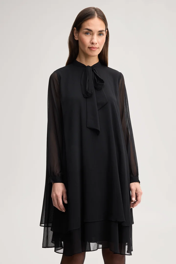 Leads to product detail page "Black chiffon dress with a bow tie"
