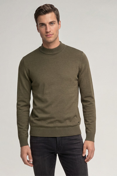 Leads to product detail page "Dark green virgin wool crew-neck jumper"