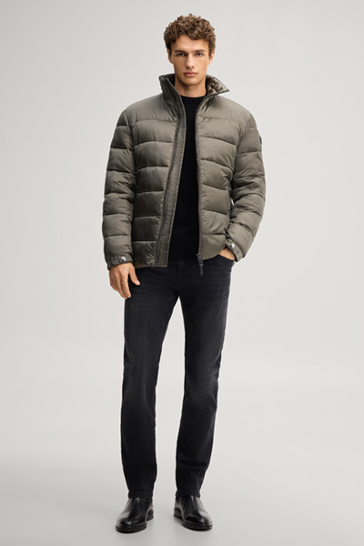 Leads to product detail page "Quilted jacket with a stand-up collar in dark green"