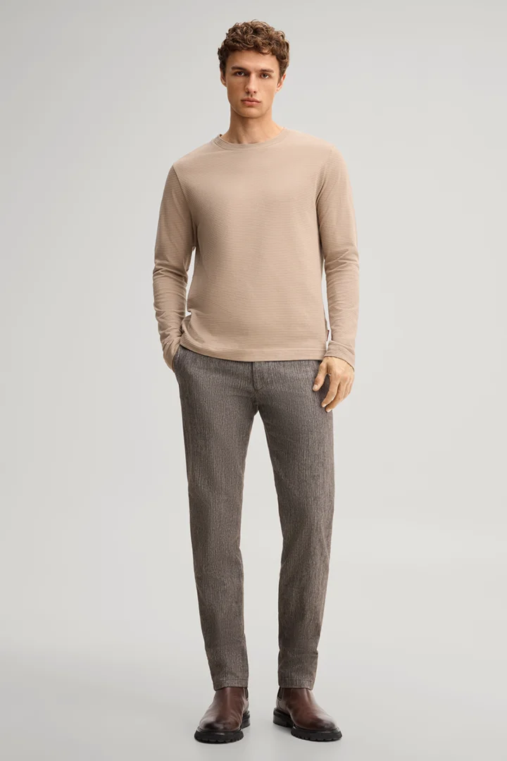 Leads to product detail page "Brown cotton longsleeve top"