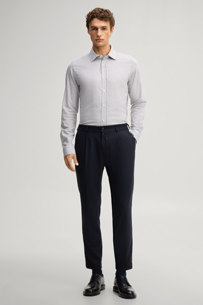 Leads to product detail page "Light grey cotton shirt"