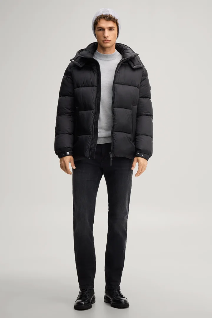 Leads to product detail page "Black hooded quilted jacket"