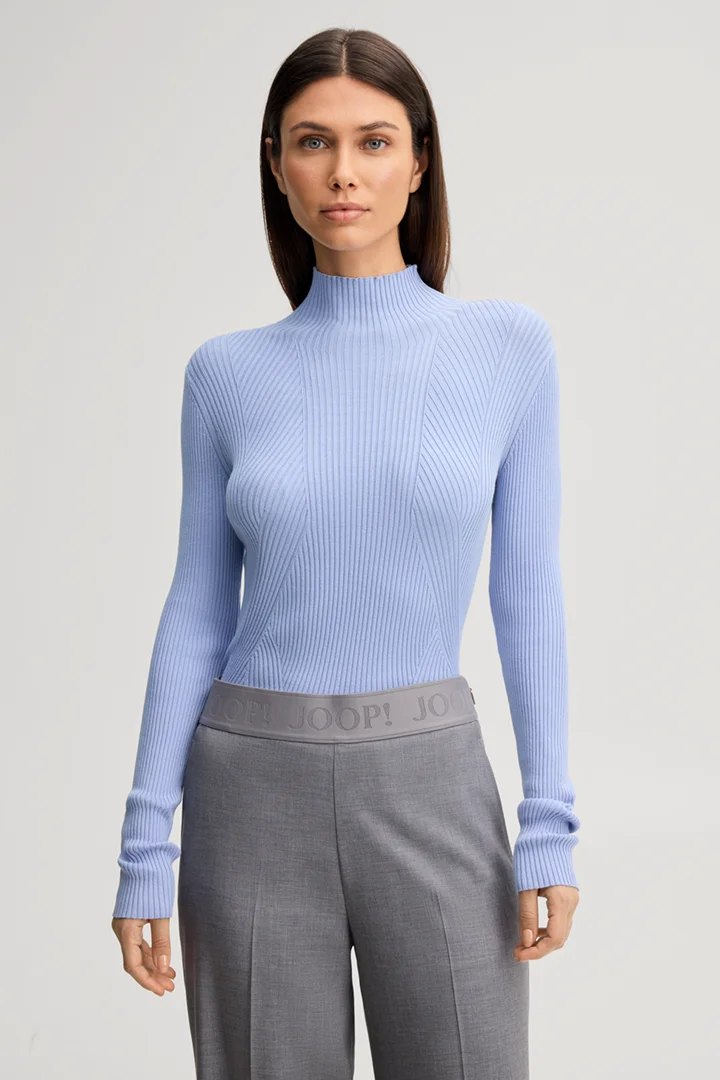 Leads to product detail page "Light blue viscose-blend jumper with a stand-up collar"