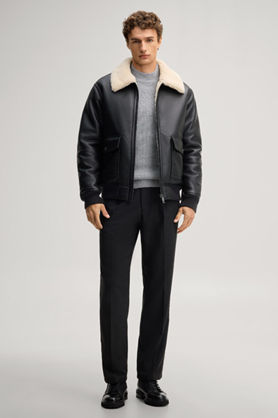 Leads to product detail page "Black vegan leather blouson"