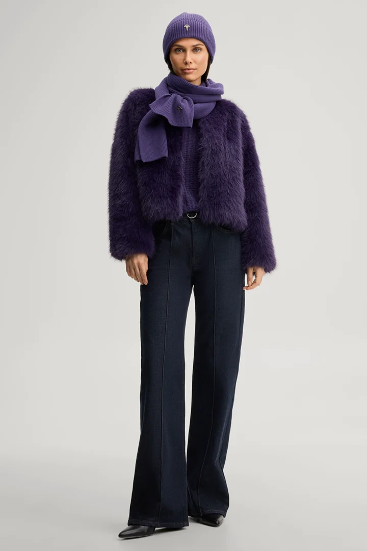Leads to product detail page "Faux fur jacket in purple"