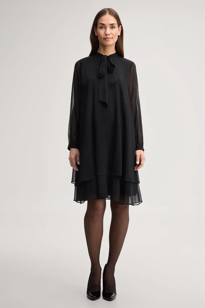 Leads to product detail page "Black chiffon dress with a bow tie"