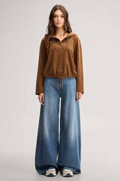 Leads to product detail page "Light brown corduroy blouse with a hood"