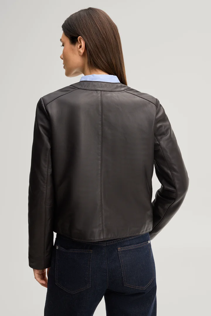 Leads to product detail page "Dark brown leather jacket "